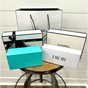 Lot of designer bags and boxes